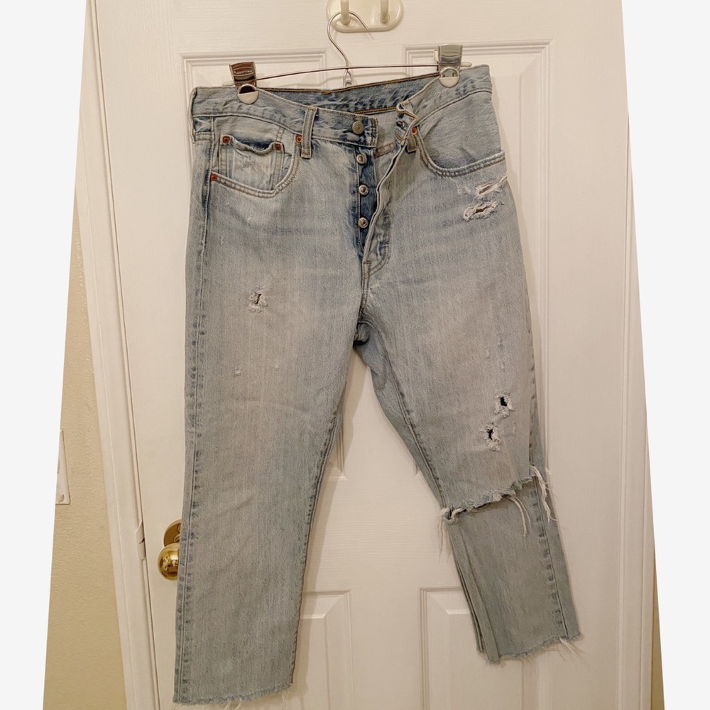 Levi’s 501 distressed jeans
